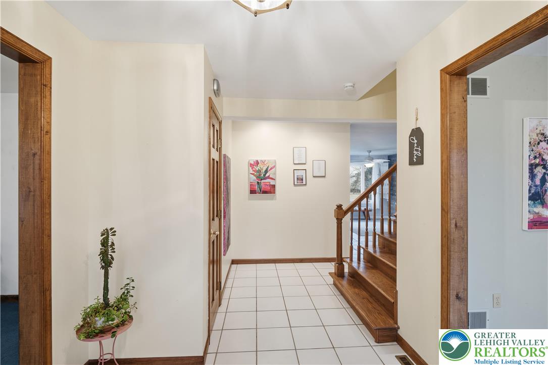 2160 Kecks Road Fogelsville, PA 18051 - Photo 18 of 58 a view of an entryway with wooden floor