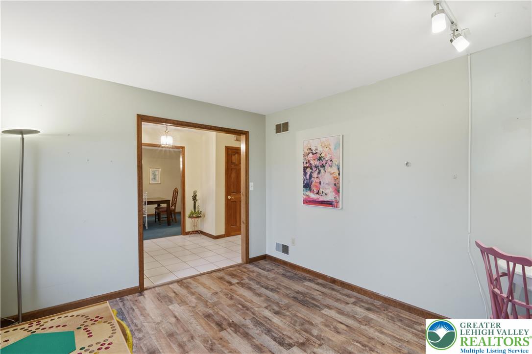 2160 Kecks Road Fogelsville, PA 18051 - Photo 21 of 58 a view of a room with wooden floor and bathroom