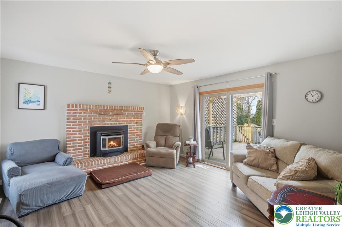 2160 Kecks Road Fogelsville, PA 18051 - Photo 24 of 58 a living room with furniture and a fireplace