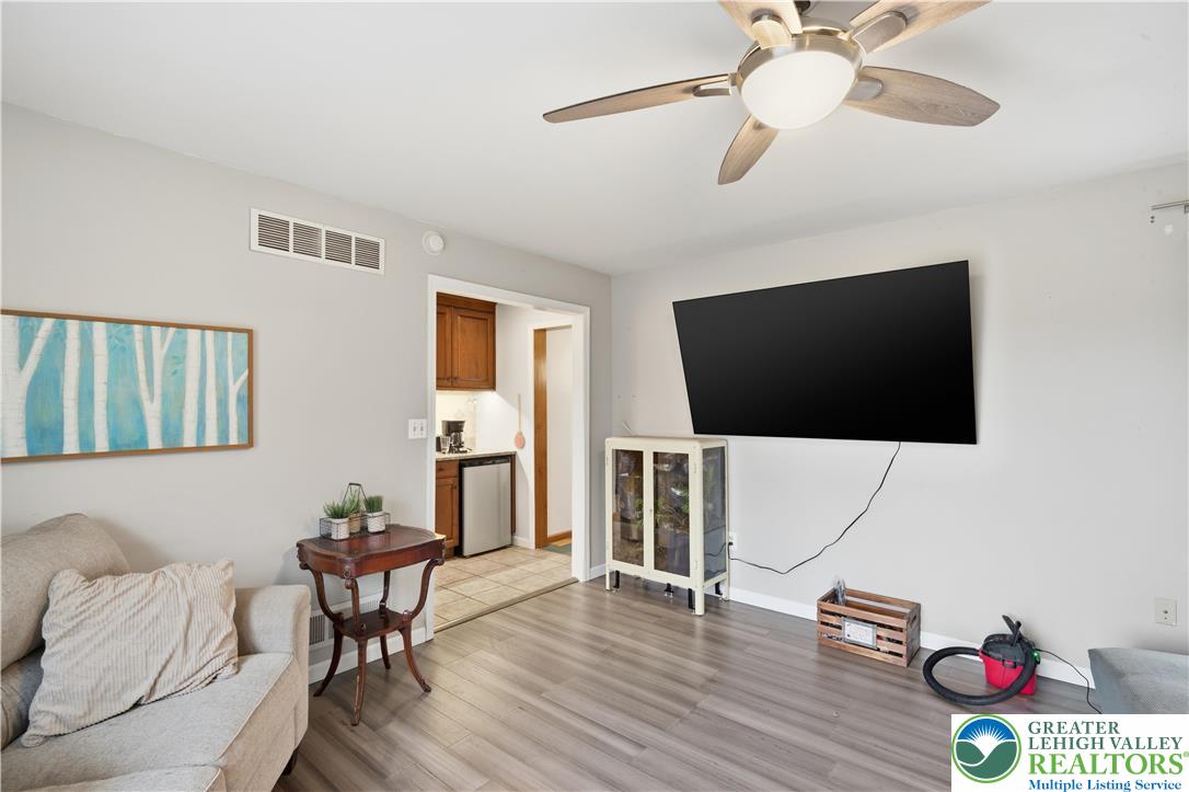 2160 Kecks Road Fogelsville, PA 18051 - Photo 25 of 58 a living room with furniture and a flat screen tv