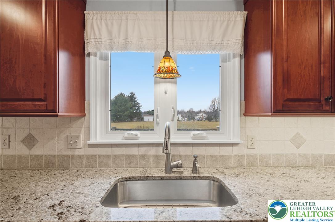 2160 Kecks Road Fogelsville, PA 18051 - Photo 27 of 58 a kitchen with a sink cabinets and window