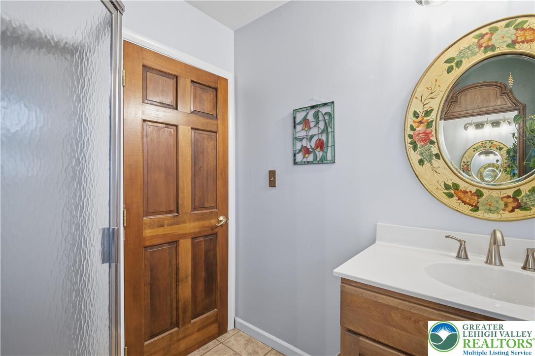 2160 Kecks Road Fogelsville, PA 18051 - Photo 34 of 58 a bathroom with a sink and a mirror