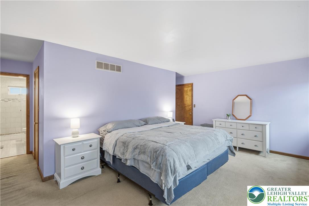 2160 Kecks Road Fogelsville, PA 18051 - Photo 42 of 58 a bedroom with a bed and a dresser