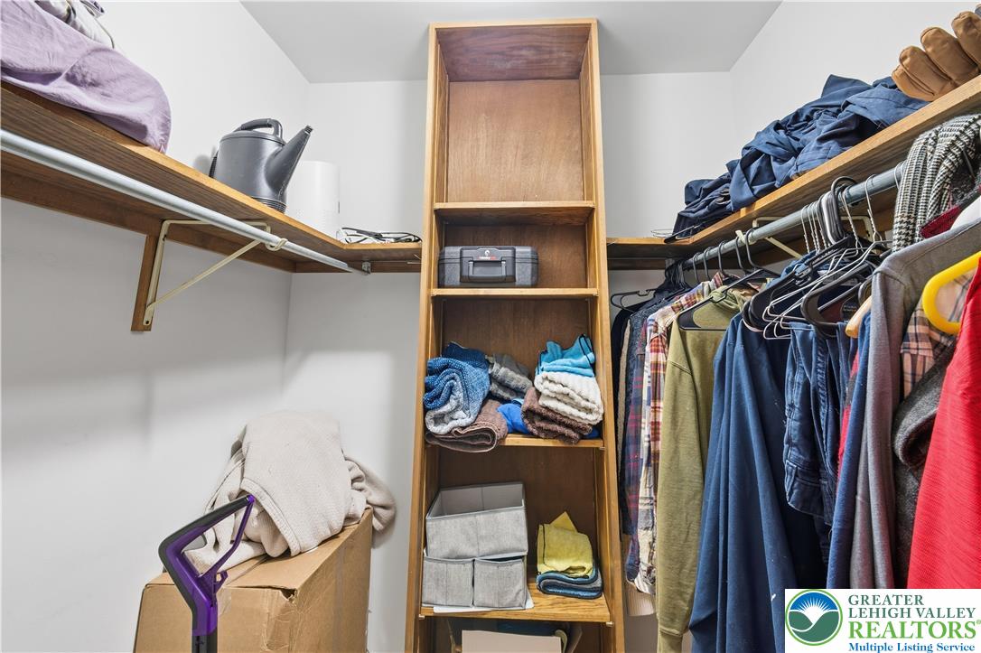 2160 Kecks Road Fogelsville, PA 18051 - Photo 43 of 58 a view of walk in closet with clothes and shoes
