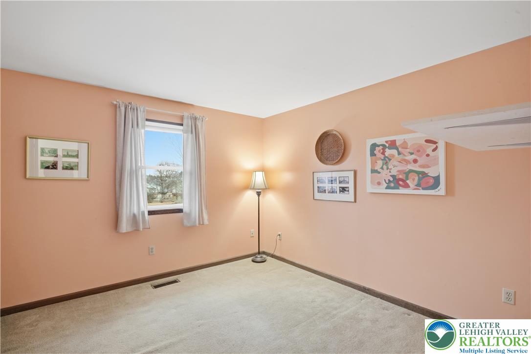 2160 Kecks Road Fogelsville, PA 18051 - Photo 47 of 58 a view of a hallway with paintings on the wall