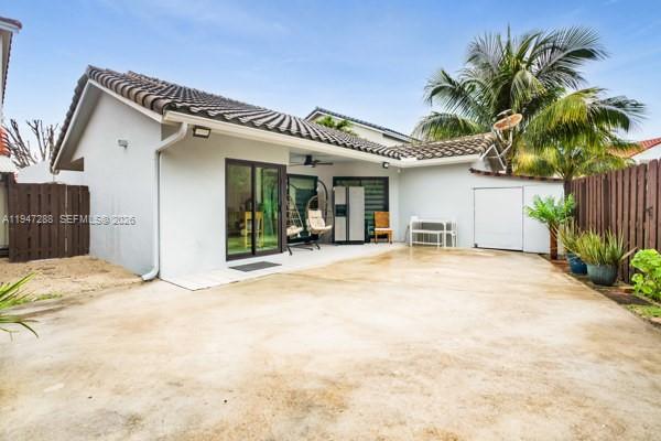 4917 Southwest 154th Avenue Miami, FL 33185 - Photo 22 of 34 a view of a house with a patio