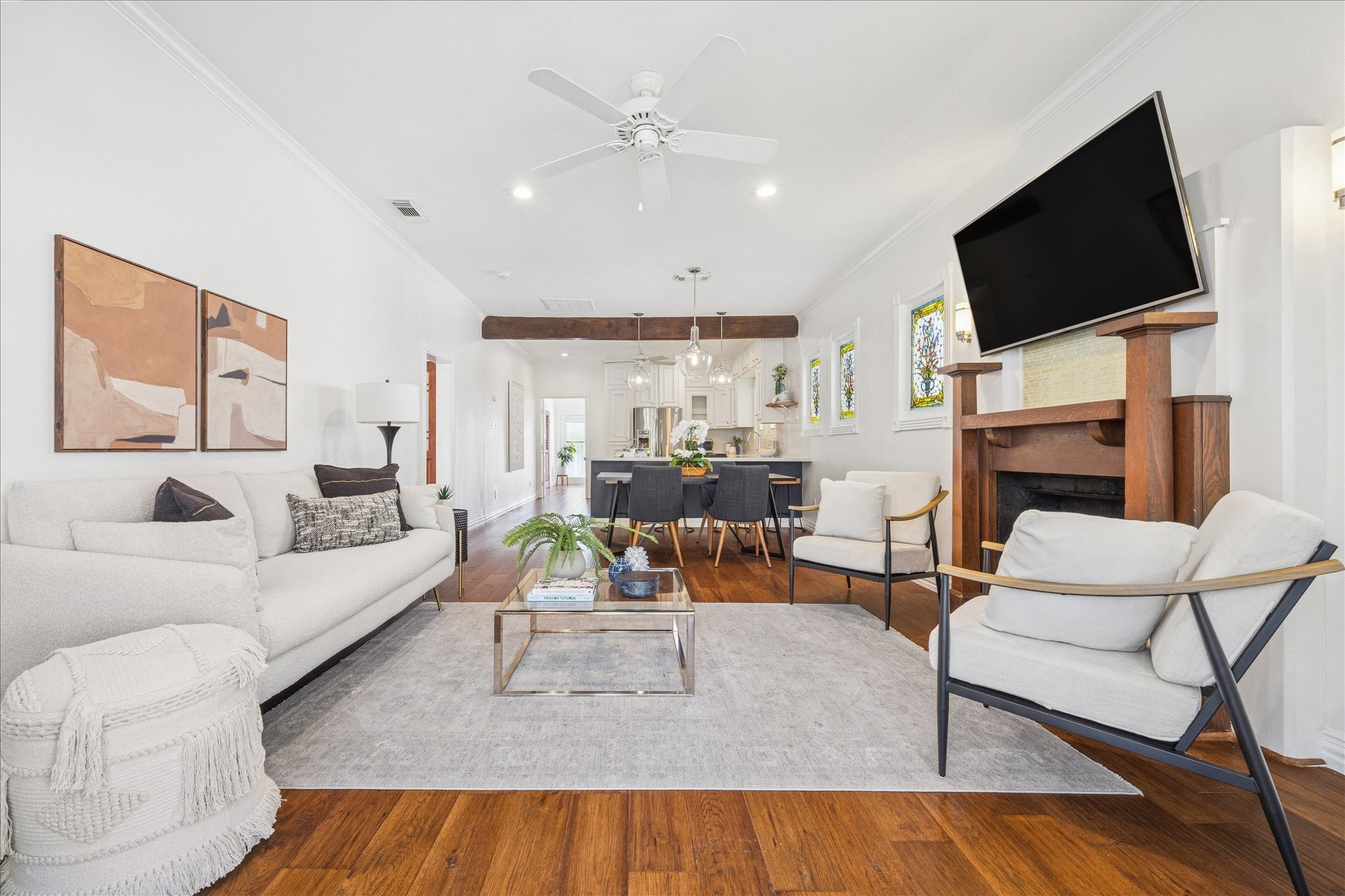 709 Walton Street Houston, TX 77009 - Photo 13 of 31 Spacious living room featuring recessed lighting, ceiling fan, and an open-concept layout.