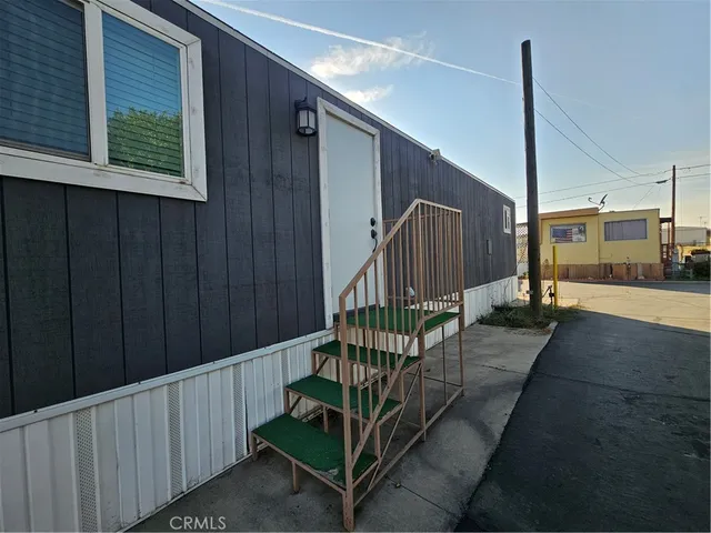 a view of a balcony with stairs
