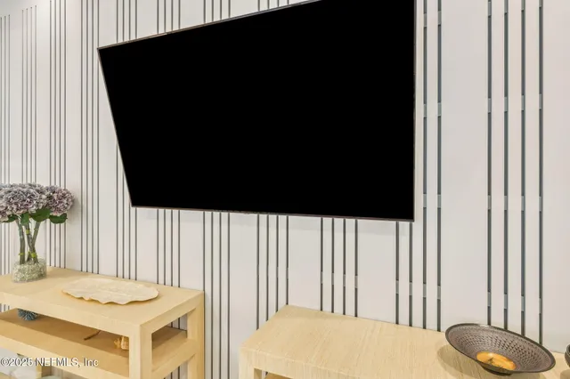 a kitchen with stainless steel appliances granite countertop white cabinets stove and granite counter tops