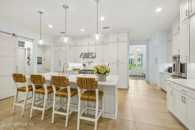 a view of a kitchen with a sink