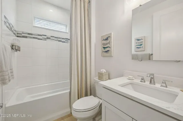 a view of a house with backyard sitting area and porch