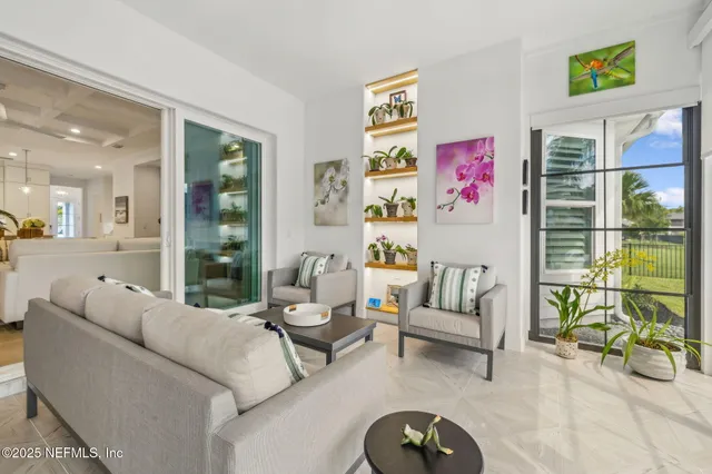 a swimming pool with outdoor seating yard and outdoor seating