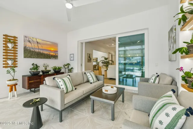 a view of a table and chairs under an umbrella