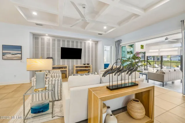a large kitchen with a table and chairs