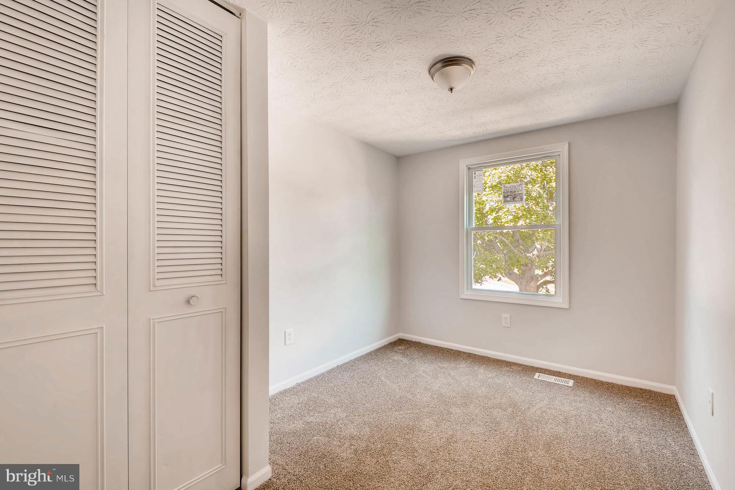 7 Raintree Court Baltimore, MD 21221 - Photo 14 of 27 Bedroom 3 w/ new carpet