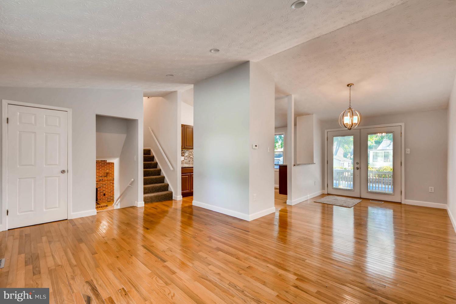 7 Raintree Court Baltimore, MD 21221 - Photo 5 of 27 Living Room w/ natural light and HW floors