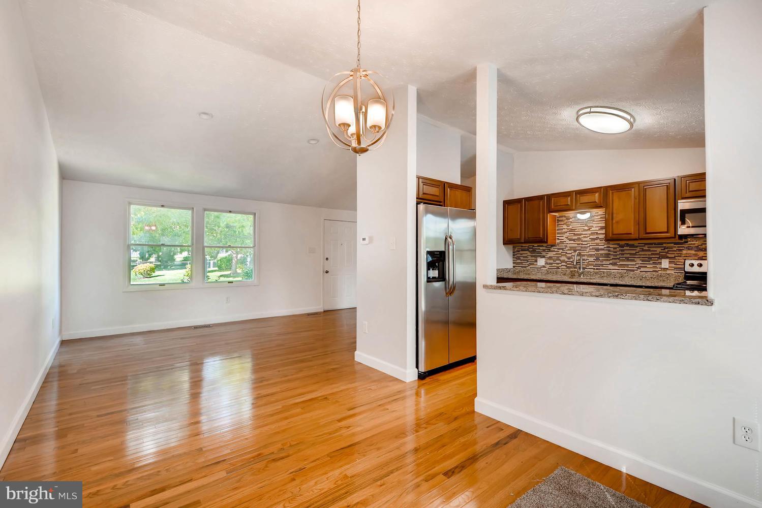 7 Raintree Court Baltimore, MD 21221 - Photo 6 of 27 View from DR into LR and KIT