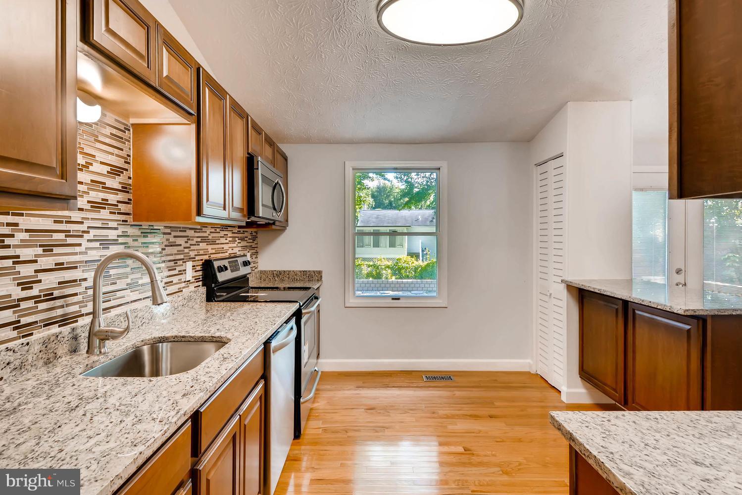 7 Raintree Court Baltimore, MD 21221 - Photo 8 of 27 NEW KIT w/ SS appliances and breakfast bar