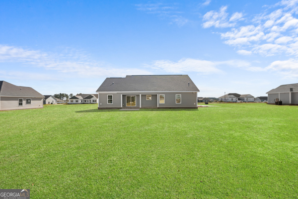 912 Ryegrass Road Statesboro, GA 30458 - Photo 18 of 19 a front view of a house with garden