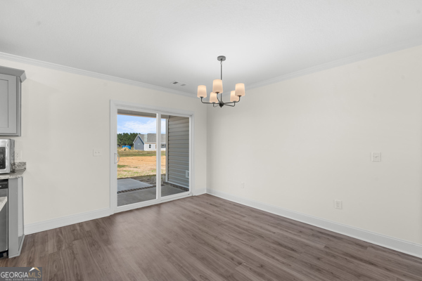 912 Ryegrass Road Statesboro, GA 30458 - Photo 8 of 19 a view of an empty room with a window