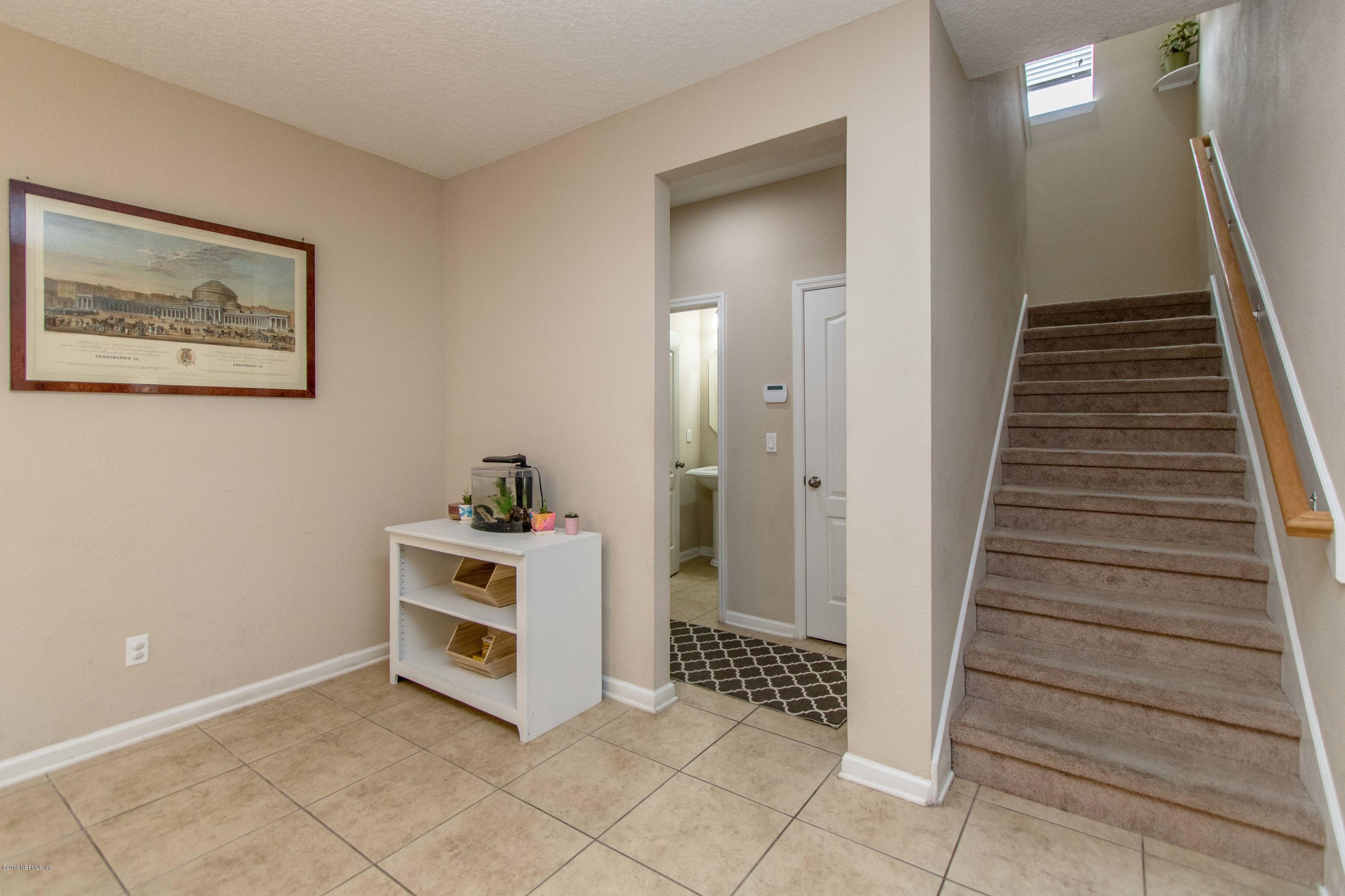 3815 Chasing Falls Road Orange Park, FL 32065 - Photo 16 of 60 Half Bath & Stairwell to Bedrooms