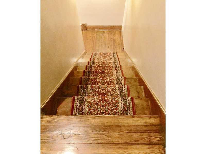 604 Newport Road New Beaver, PA 16157 - Photo 15 of 16 View. Staircase from the upper level