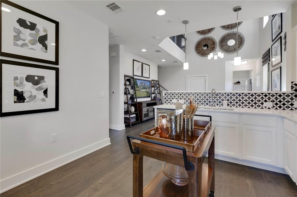 12109 Maypole Bend Austin, TX 78717 - Photo 8 of 27 a view of a livingroom with furniture and a large window