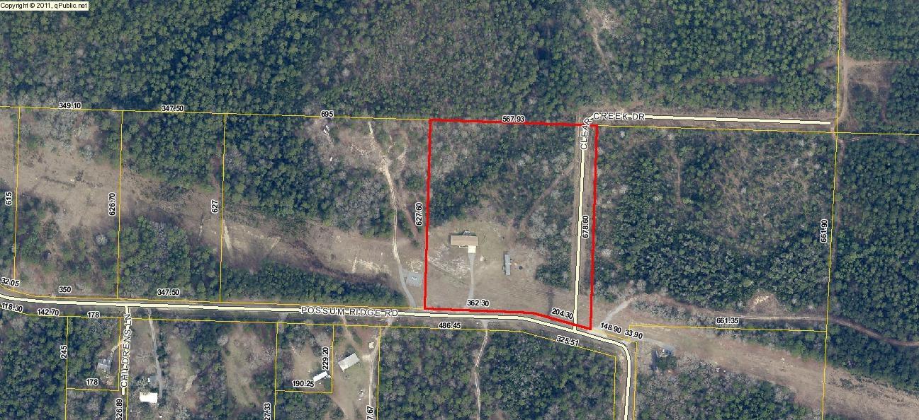 6540 Possum Ridge Road Crestview, FL 32539 - Photo 23 of 23 a view of a wooden bridge