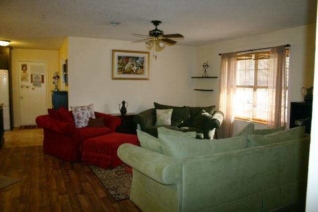 6540 Possum Ridge Road Crestview, FL 32539 - Photo 8 of 23 a living room with furniture and a window