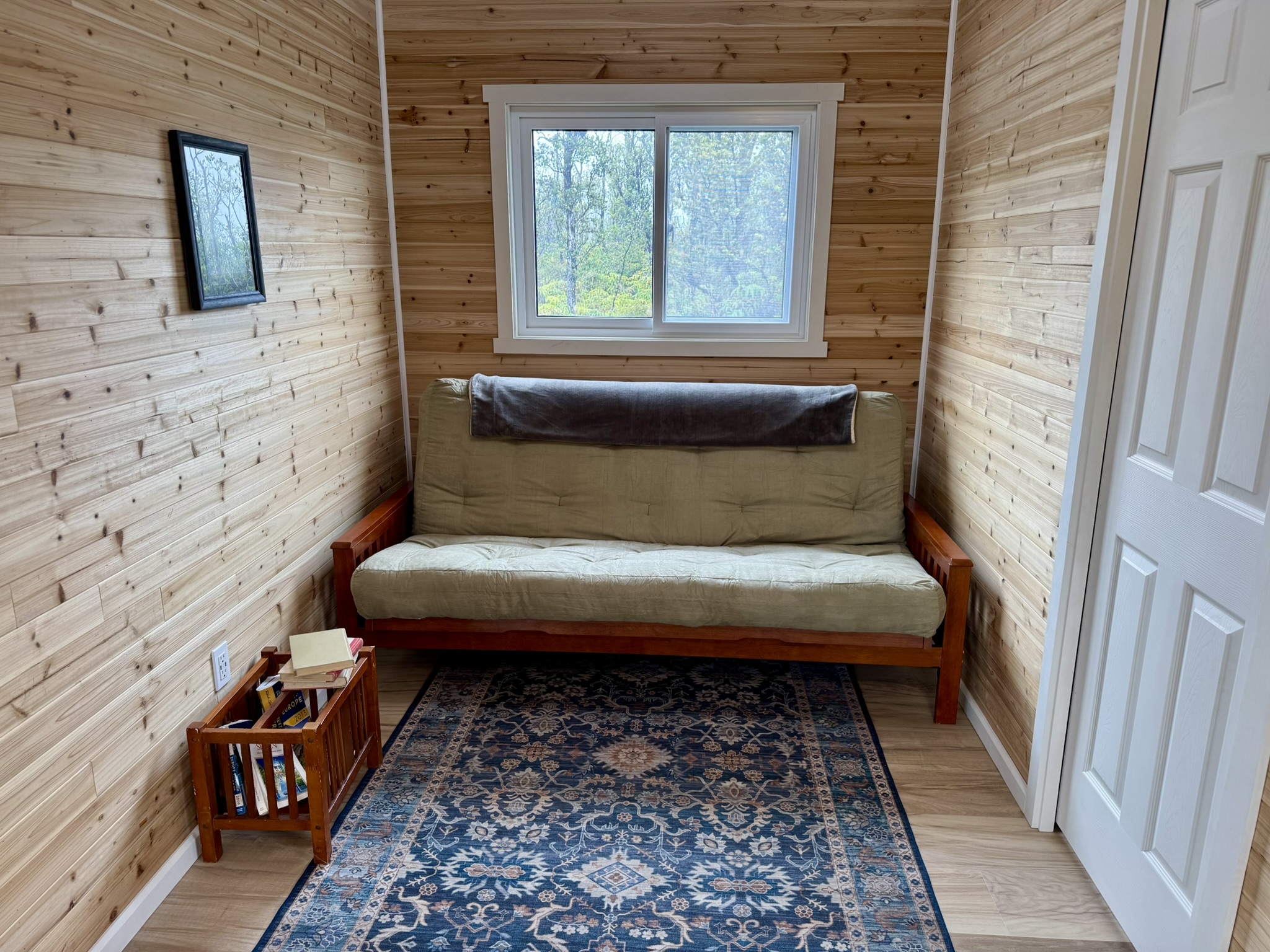 11-3048 Ala Naualani Road Mountain View, HI 96771 - Photo 6 of 29 a bathroom with a toilet and a shower curtain