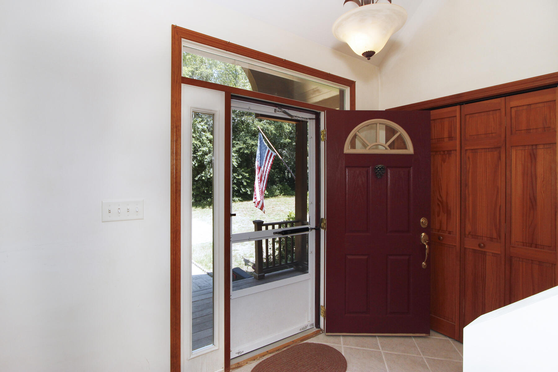 495 Aspinet Road Eastham, MA 02642 - Photo 13 of 47 a view of a hallway with wooden floor and entryway