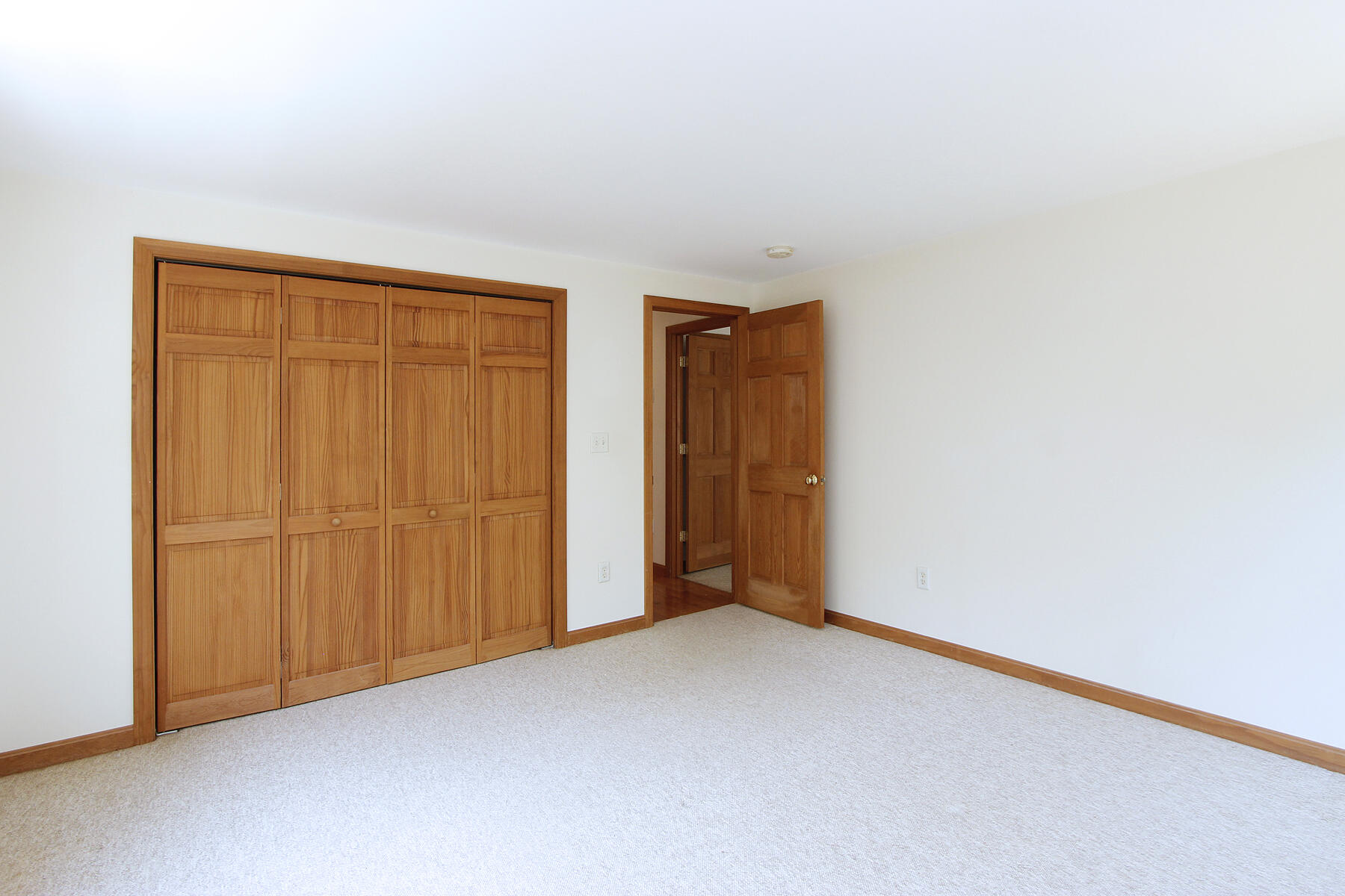 495 Aspinet Road Eastham, MA 02642 - Photo 19 of 47 a view of an empty room and closet area
