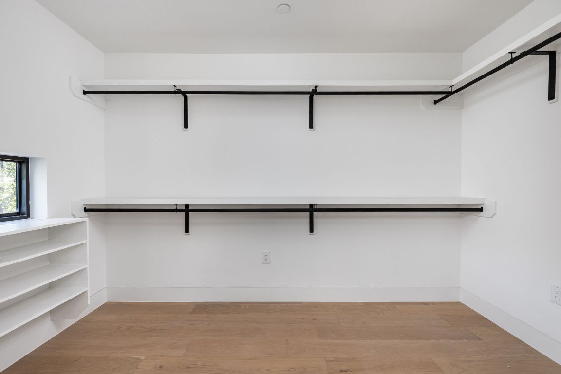 1603 Chelsea Lane, Unit 1 Austin, TX 78704 - Photo 21 of 40 Spacious closet with light wood-style flooring