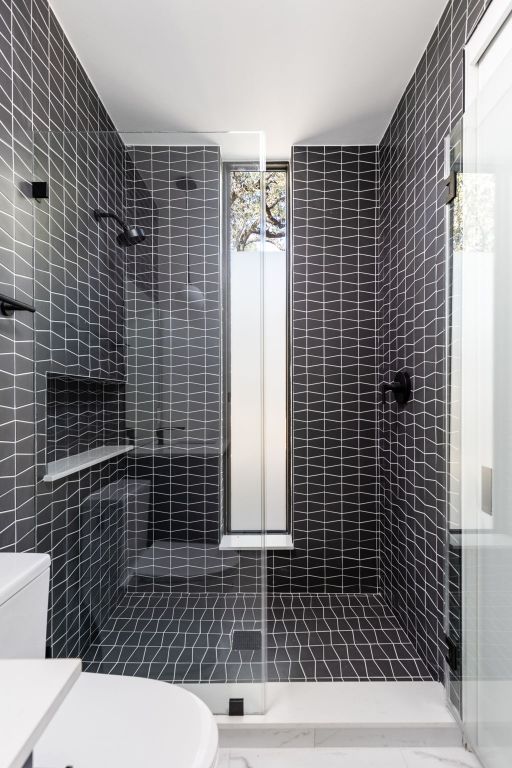 1603 Chelsea Lane, Unit 1 Austin, TX 78704 - Photo 24 of 40 Bathroom featuring a shower stall and vanity