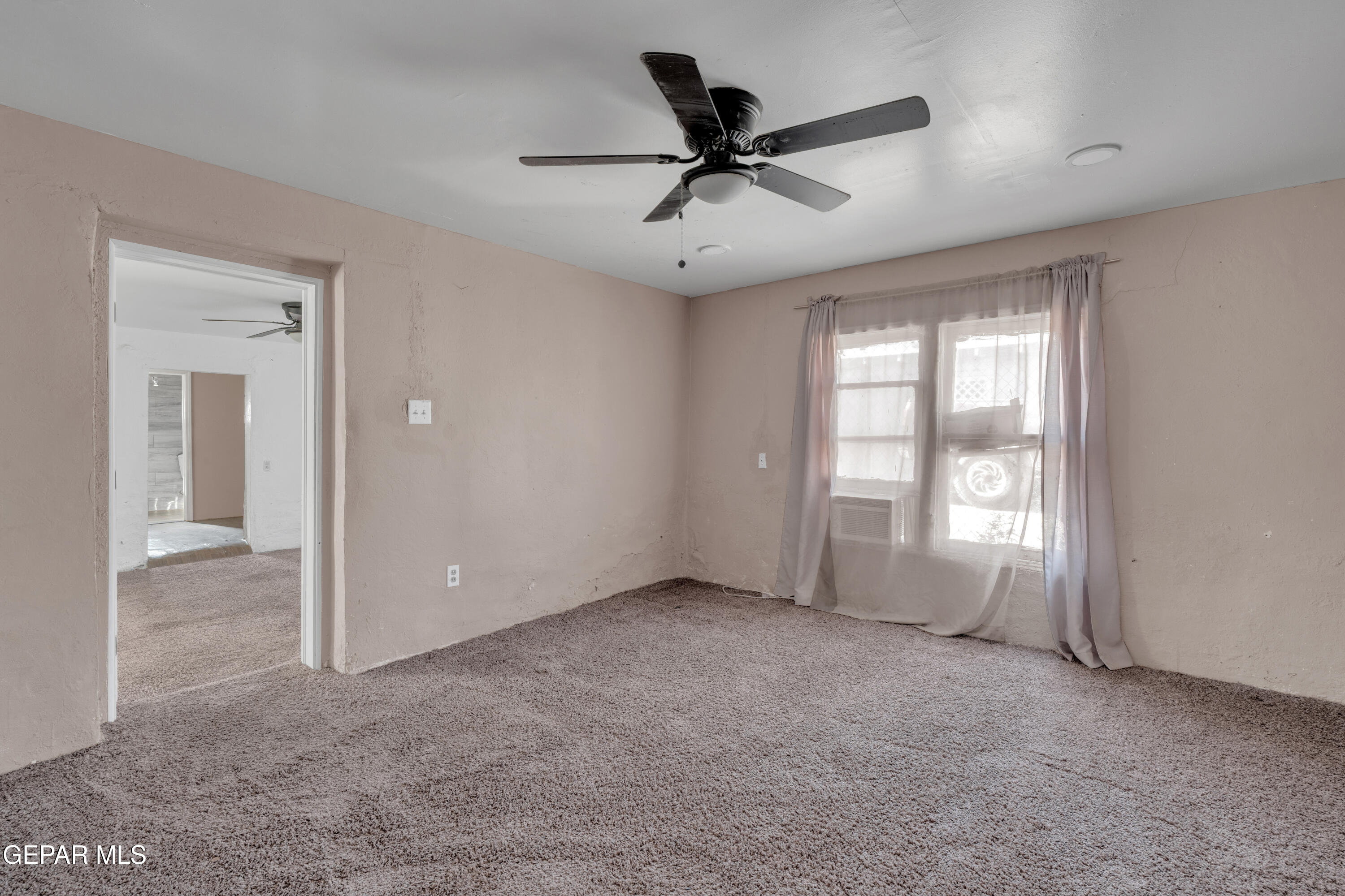 10184 Haynes Road Socorro, TX 79927 - Photo 16 of 25 a view of an empty room with a window