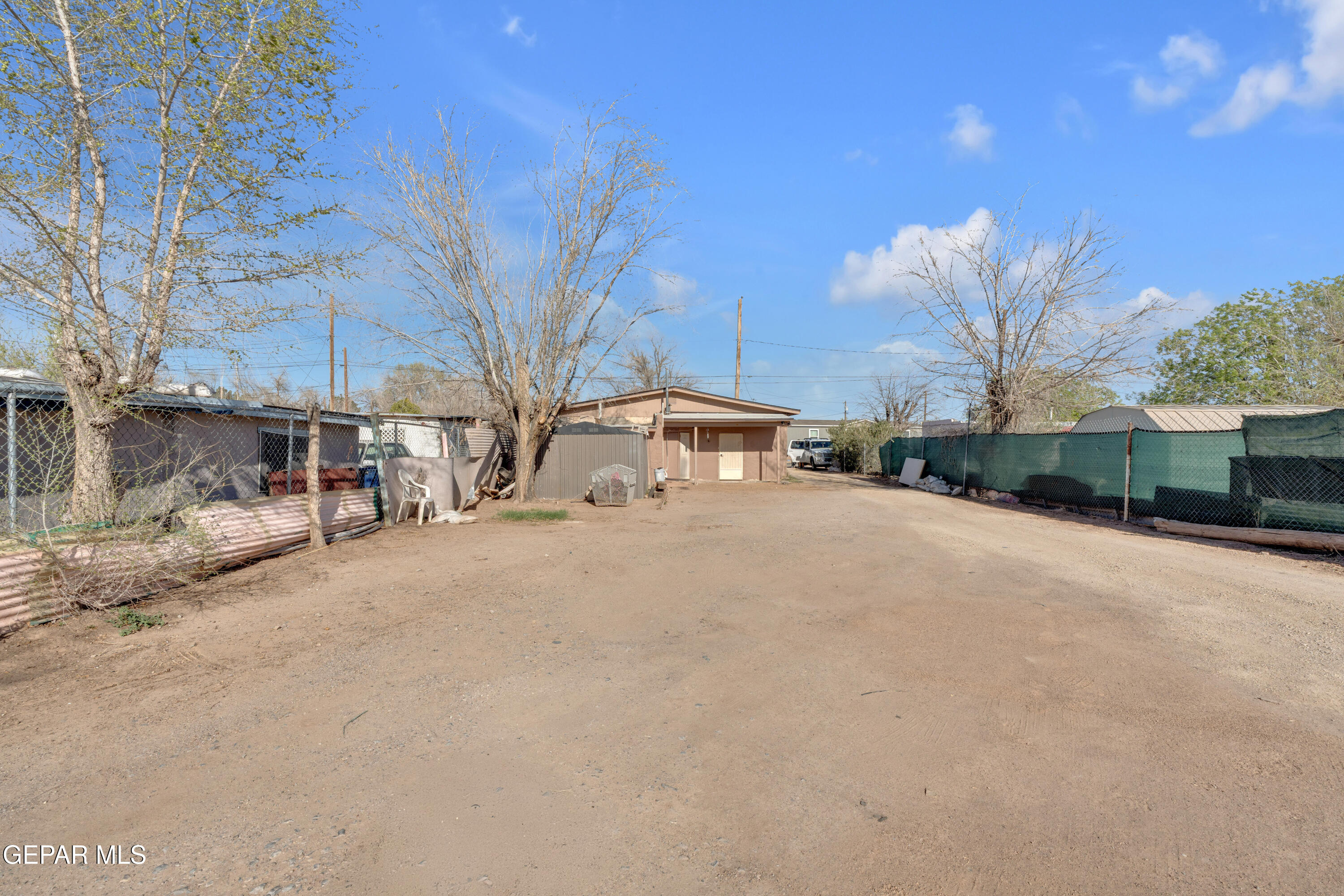 10184 Haynes Road Socorro, TX 79927 - Photo 25 of 25 a view of road with large trees