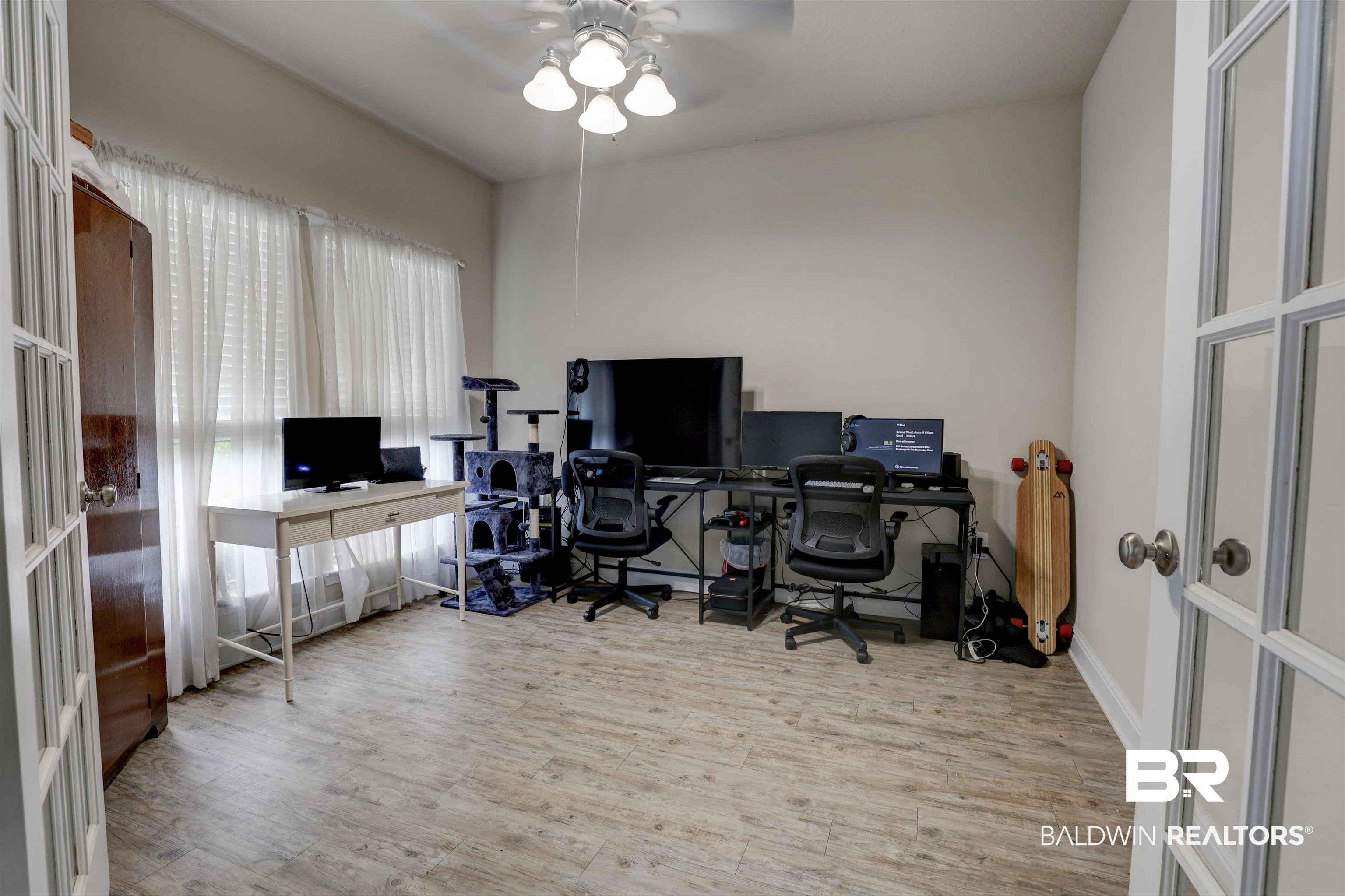 21902 Yosemite Boulevard Fairhope, AL 36532 - Photo 5 of 32 Office space with ceiling fan and hardwood / wood-style flooring