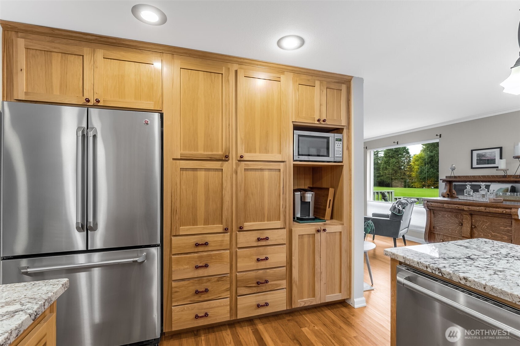 6524 Northeast 171st Place Kenmore, WA 98028 - Photo 12 of 35 a kitchen with stainless steel appliances granite countertop a refrigerator and a stove top oven