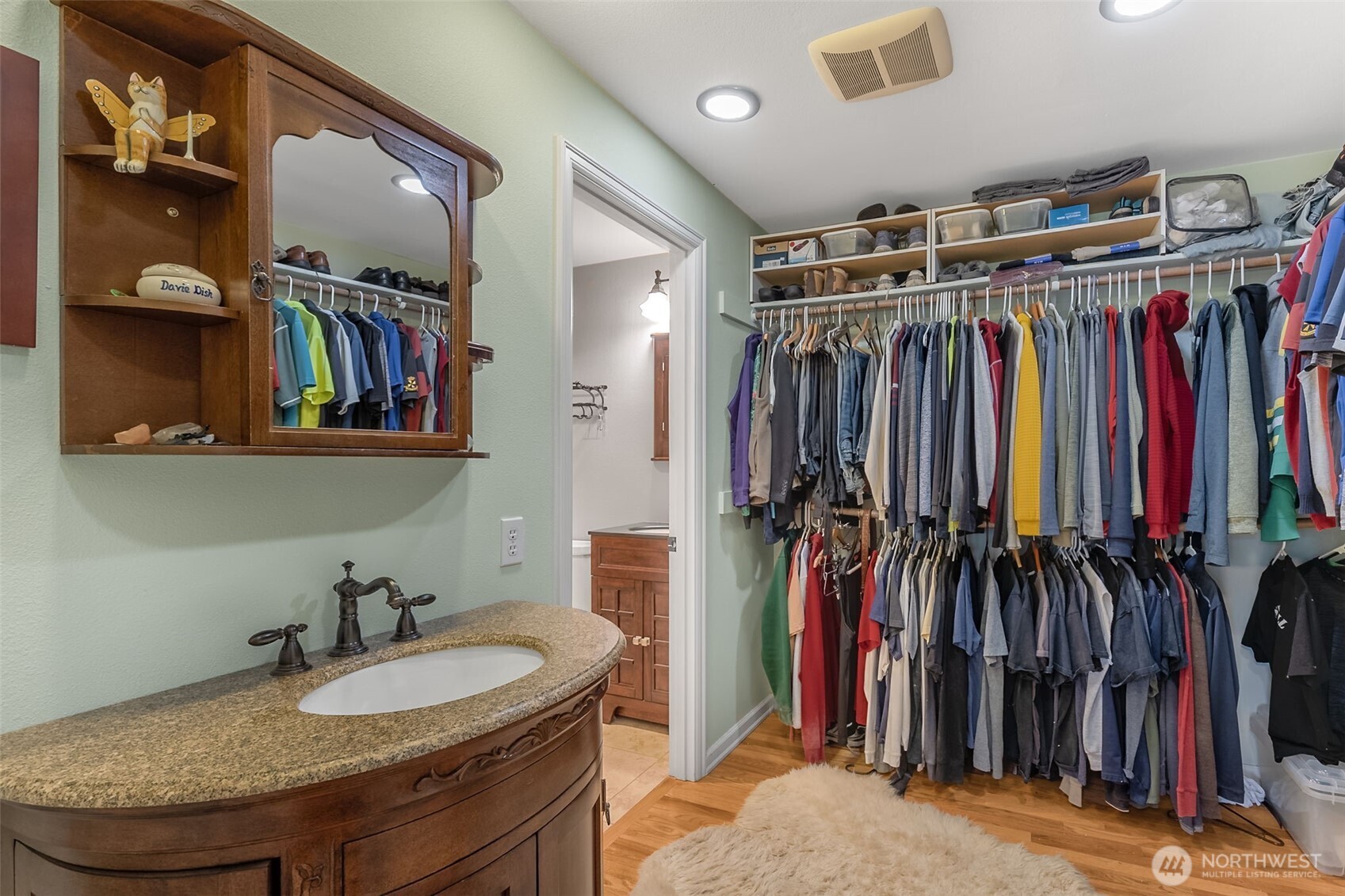 6524 Northeast 171st Place Kenmore, WA 98028 - Photo 30 of 35 a view of walk in closet with clothes