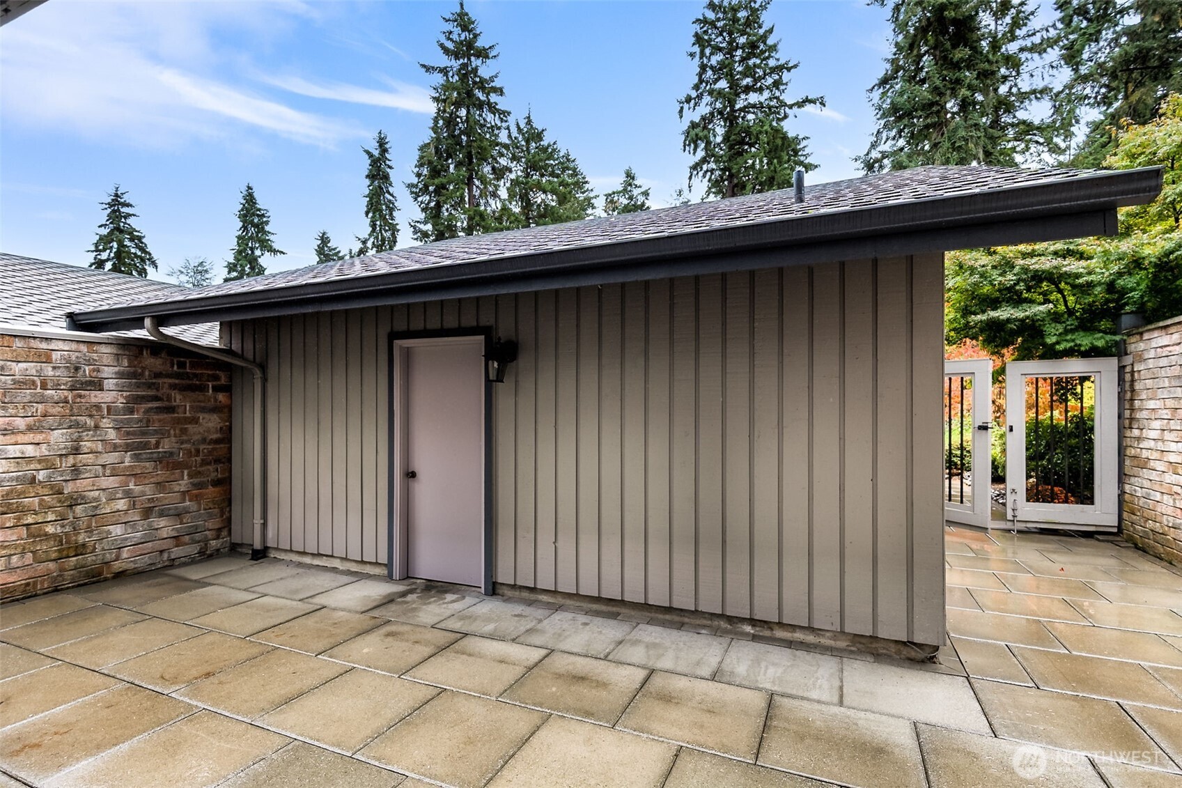 6524 Northeast 171st Place Kenmore, WA 98028 - Photo 34 of 35 a backyard of a house with lots of green space