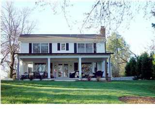 4042 Ivy Road Charlottesville, VA 22903 - Photo 1 of 1 a view front of house with a yard