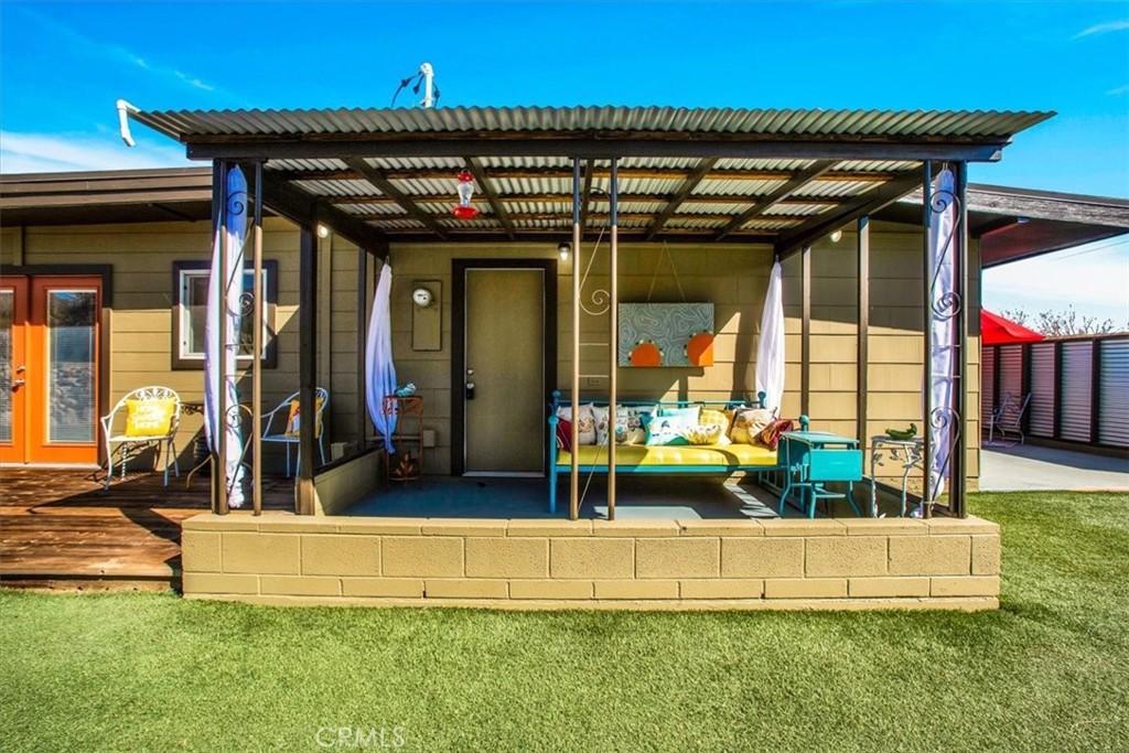 9384 Piedras Trail Morongo Valley, CA 92256 - Photo 31 of 75 a view of a house with a park