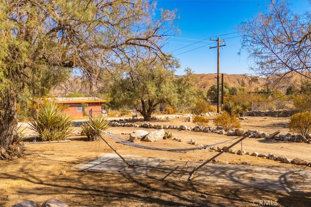 9384 Piedras Trail Morongo Valley, CA 92256 - Photo 4 of 75 a view of a snow on the road