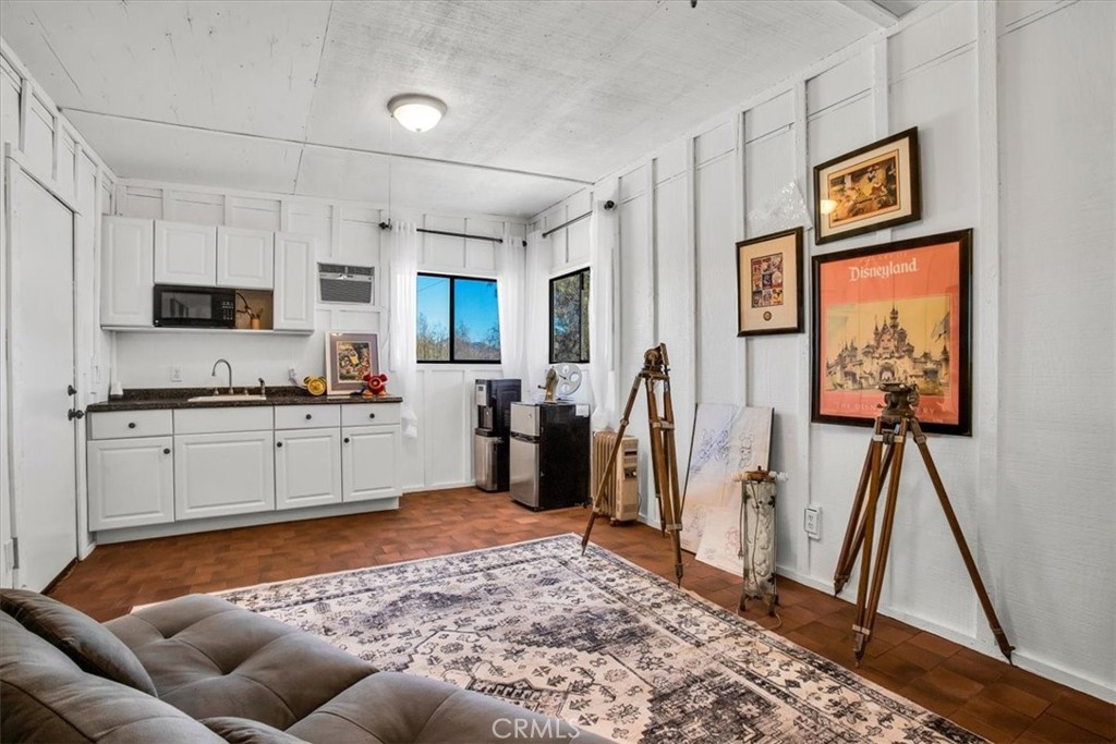 9384 Piedras Trail Morongo Valley, CA 92256 - Photo 43 of 75 a kitchen with stainless steel appliances granite countertop a refrigerator and a stove top oven