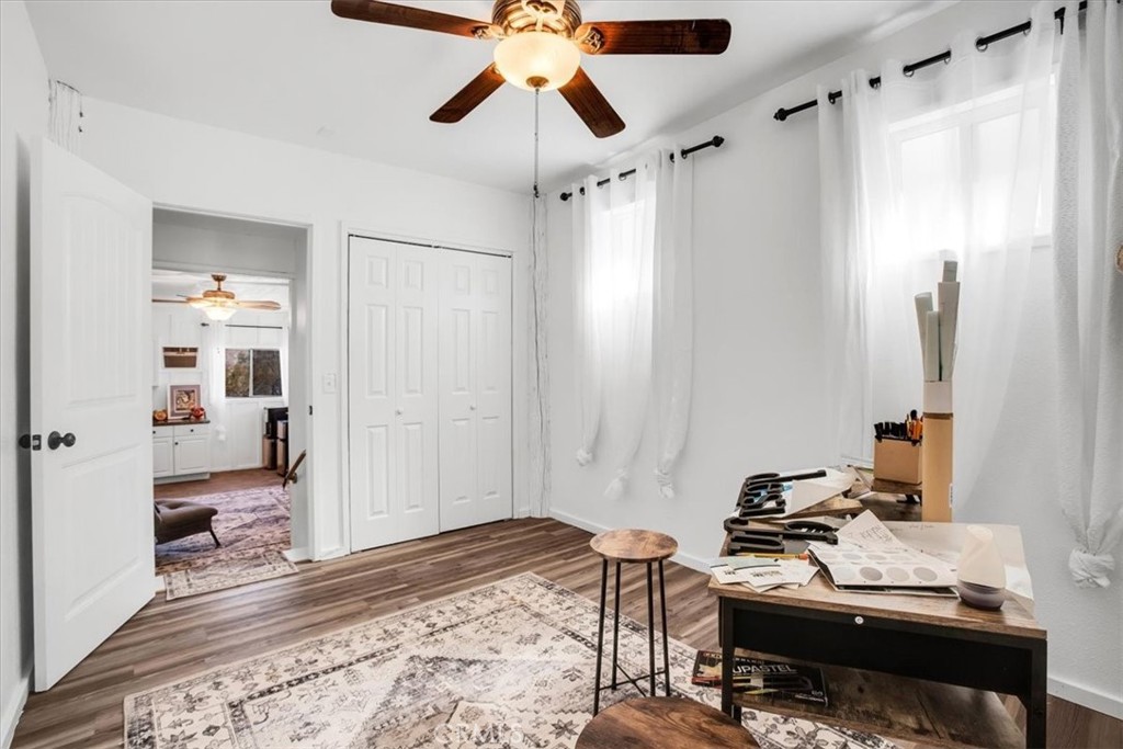 9384 Piedras Trail Morongo Valley, CA 92256 - Photo 47 of 75 a bedroom with a bed and a chandelier