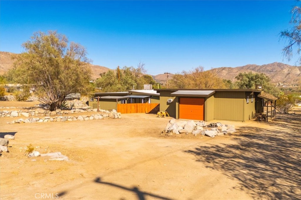 9384 Piedras Trail Morongo Valley, CA 92256 - Photo 59 of 75 a view of a lake with a mountain