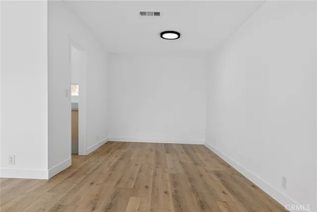 a view of small space with wooden floor