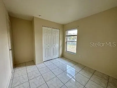 a view of an empty room and window