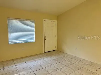 a view of a room with a window