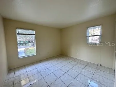 a view of an empty room and window